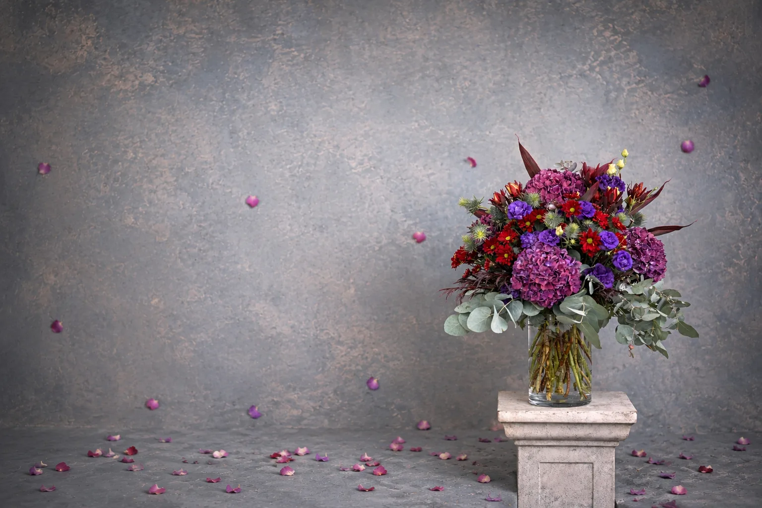 Rich Jewel Arrangement — purple hydrangea, red kangaroo-paw and eucalyptus in a glass vase